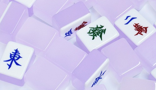 Wind and Dragon honor symbols on acrylic Mahjong tiles