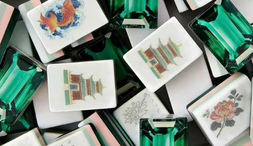 Emerald green cultural mahjong tiles featuring koi, pagoda and crane artwork