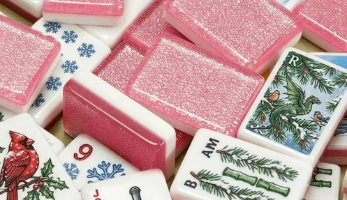 Travel American mahjong set with compact preppy navy and pink tiles